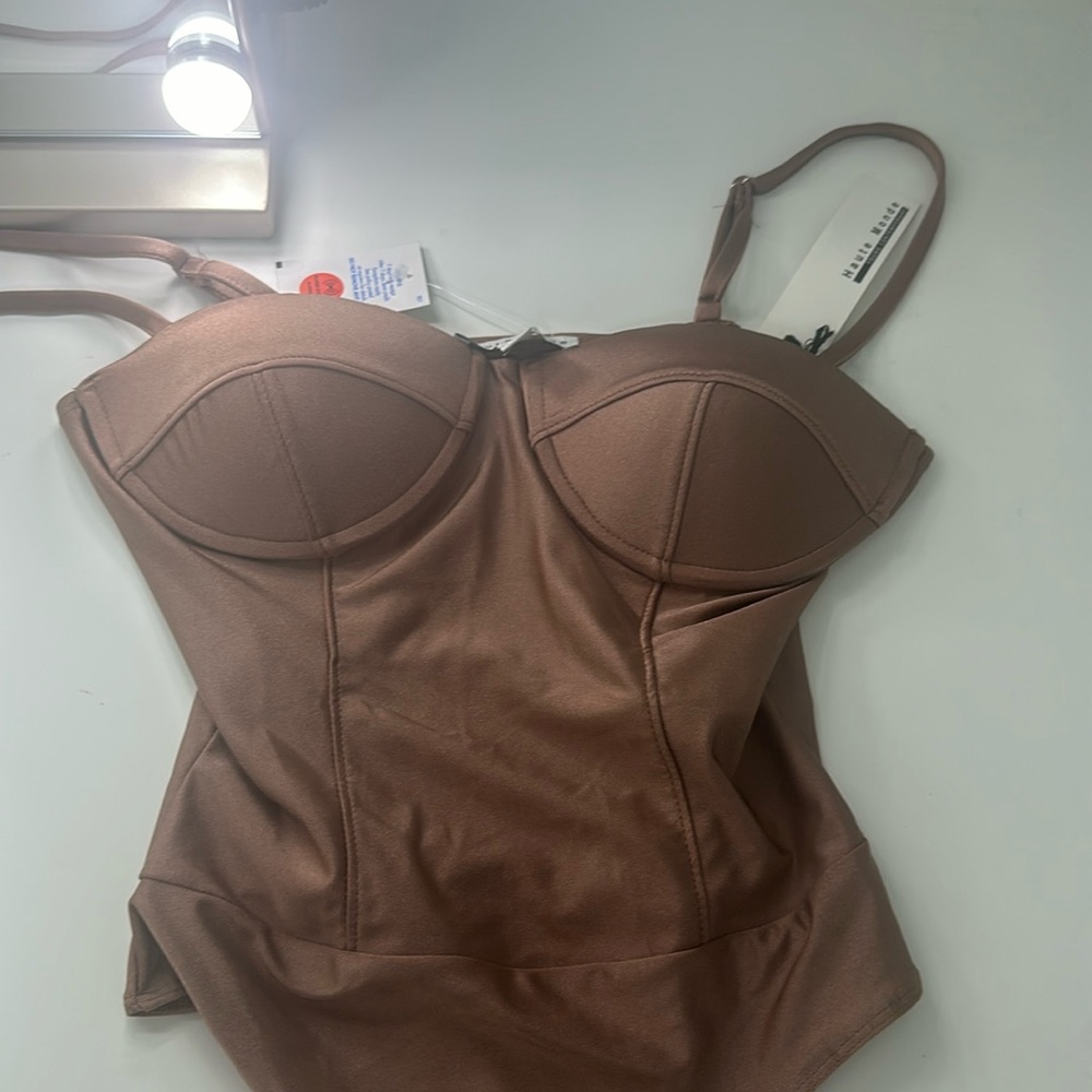 One piece haute monde brown body suite brand new never used